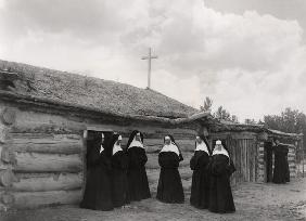 Nuns in front of the Saint Labre mission, Ashland, Montana (b/w photo) 