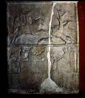 Stela relief depicting a wild boar hunt