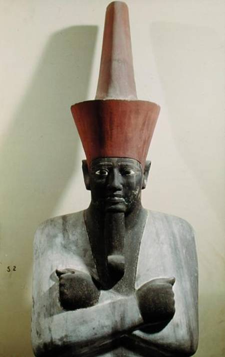 Detail of a statue of Mentuhotep II, enthroned and wearing the red crown of Lower Egypt, taken from od Egyptian