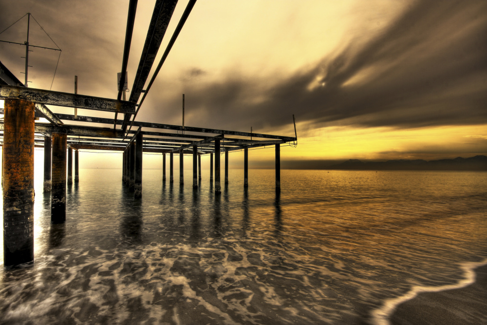 old pier and beautiful sunset od engin akyurt