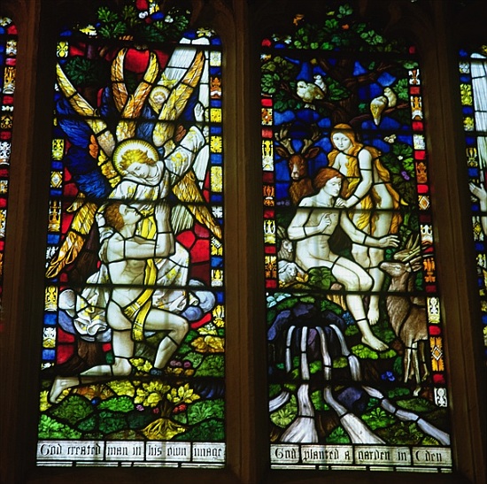Stained glass windows depicting (LtoR) The Annunciation and Adam and Eve in the Garden of Eden od English School