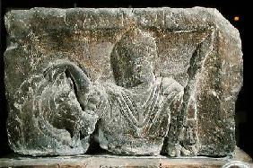 Capital from the Nautes Pillar depicting a man and a horse's head