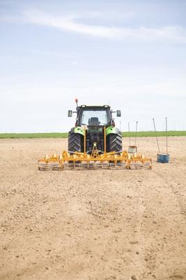 tractor backwards