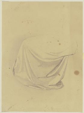 Sitting garbed figure