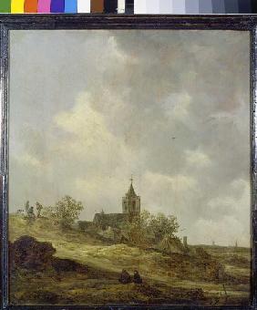 Village church in dune landscape.