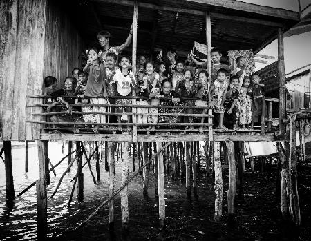 A happy family - lifestyles of the sea gipsy peoples.