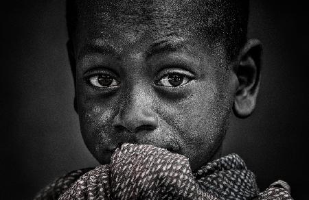 Ethiopian child at a religious ceremony.