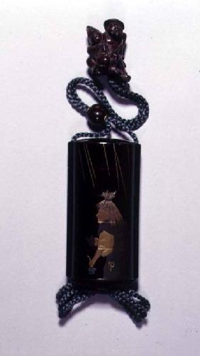 Netsuke and inro case depicting Abura Bozu, the Oil Thief