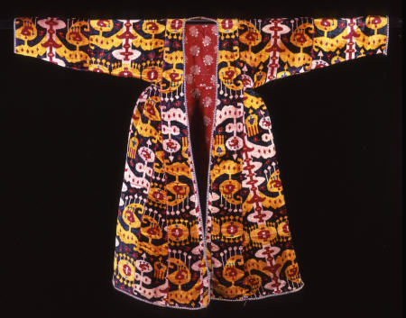 A Coat Of Silk Velvet Ikat,  Woven With Rams horns And Combed Motifs Against A Deep Green Ground, 18 od 