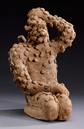 A Djenne Terracotta Kneeling Male Figure, 14th Century od 