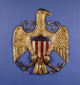 A Gilded Pressed Tin Eagle