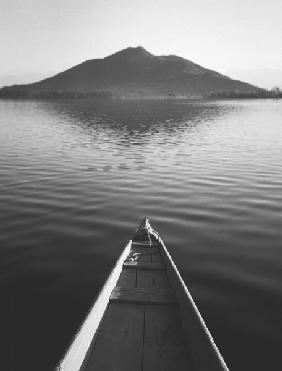 Shikara tip pointing towards shankaracharya hill Srinagar (b/w photo) 