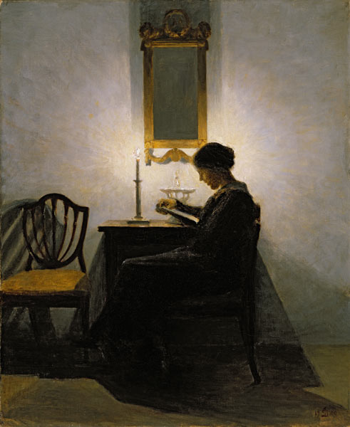 Woman reading by candlelight od Peter Vilhelm Ilsted