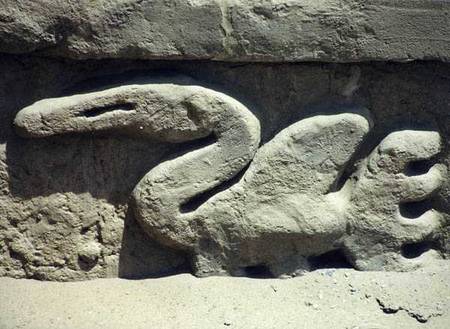Bird design on one of the walls inside the ruined pre-Inca city, built by the Chimu od Pre-Columbian