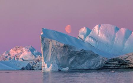 The Midnight Moon in Ilulissat Icefjord