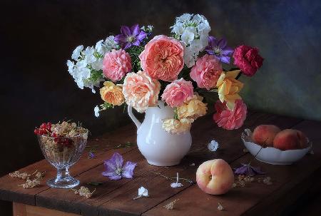 Still life with bouquet and berries