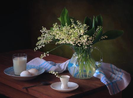 Still life with a bouquet of lilies of the valley