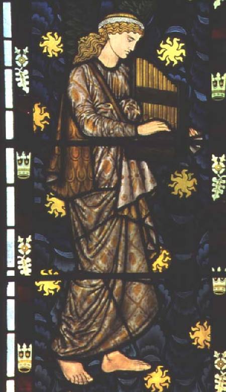 Angel with a portative organ, stained glass window designed od William  Morris